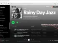 Okładka playlisty "Rainy Day Jazz" na Spotify, z widocznym interfejsem aplikacji i przyciskiem dodawania.