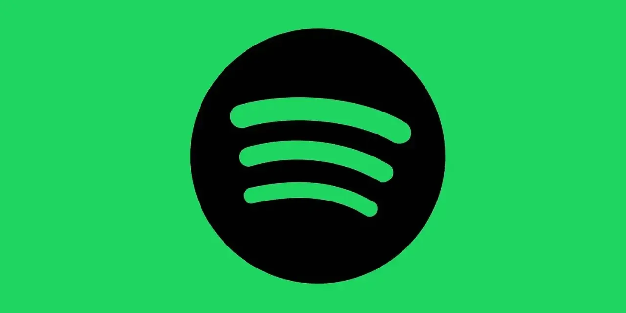 Logo Spotify na zielonym tle.