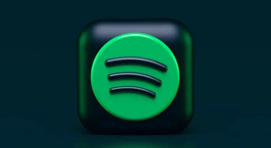 Ikona Spotify na ciemnozielonym tle.